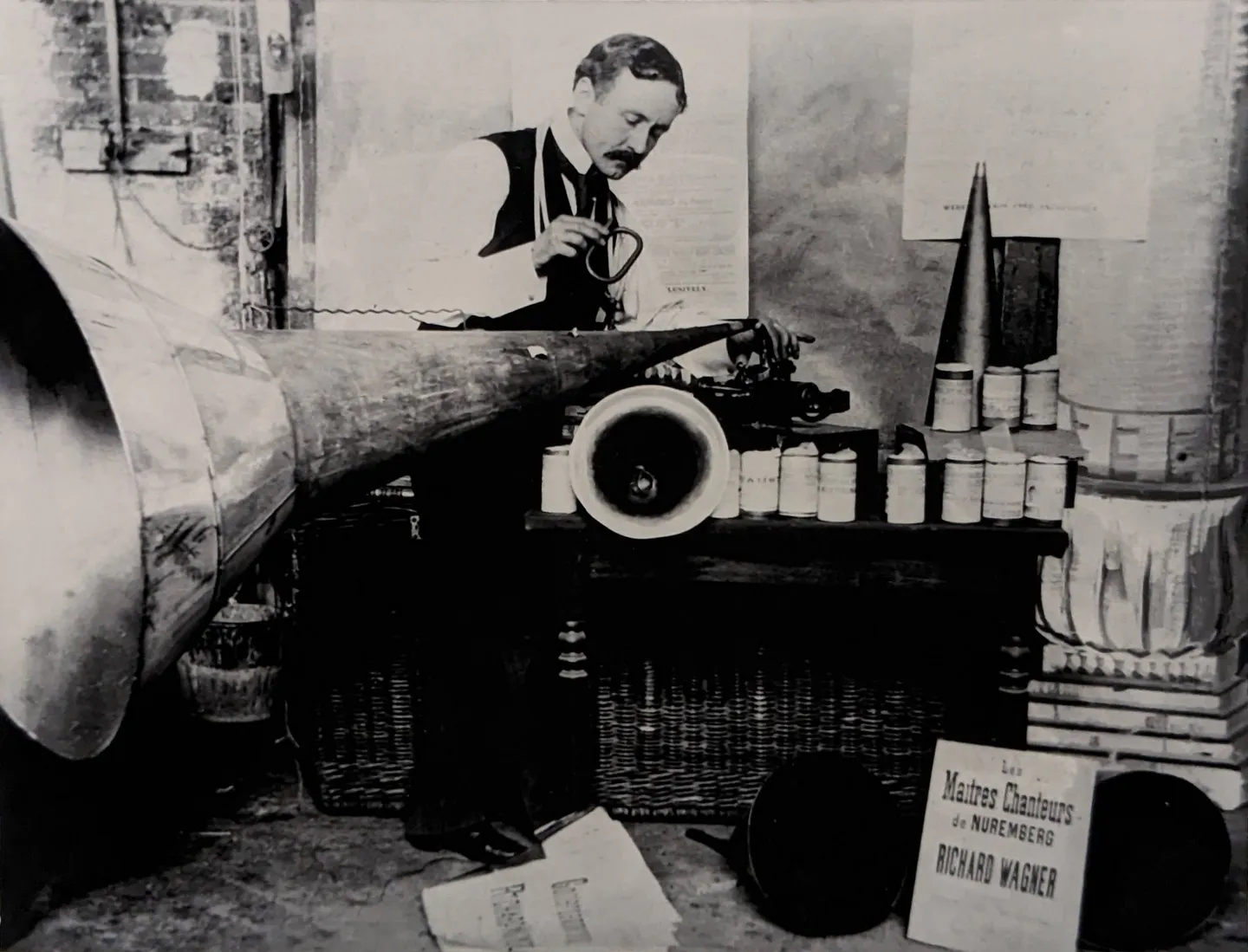 Metropolitan Opera librarian Lionel Mapleson with the Edison phonograph and wax cylinders he used to record live opera, about 1901
